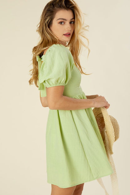 Green Tie back dress with puff sleeves