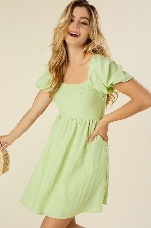 Green Tie back dress with puff sleeves